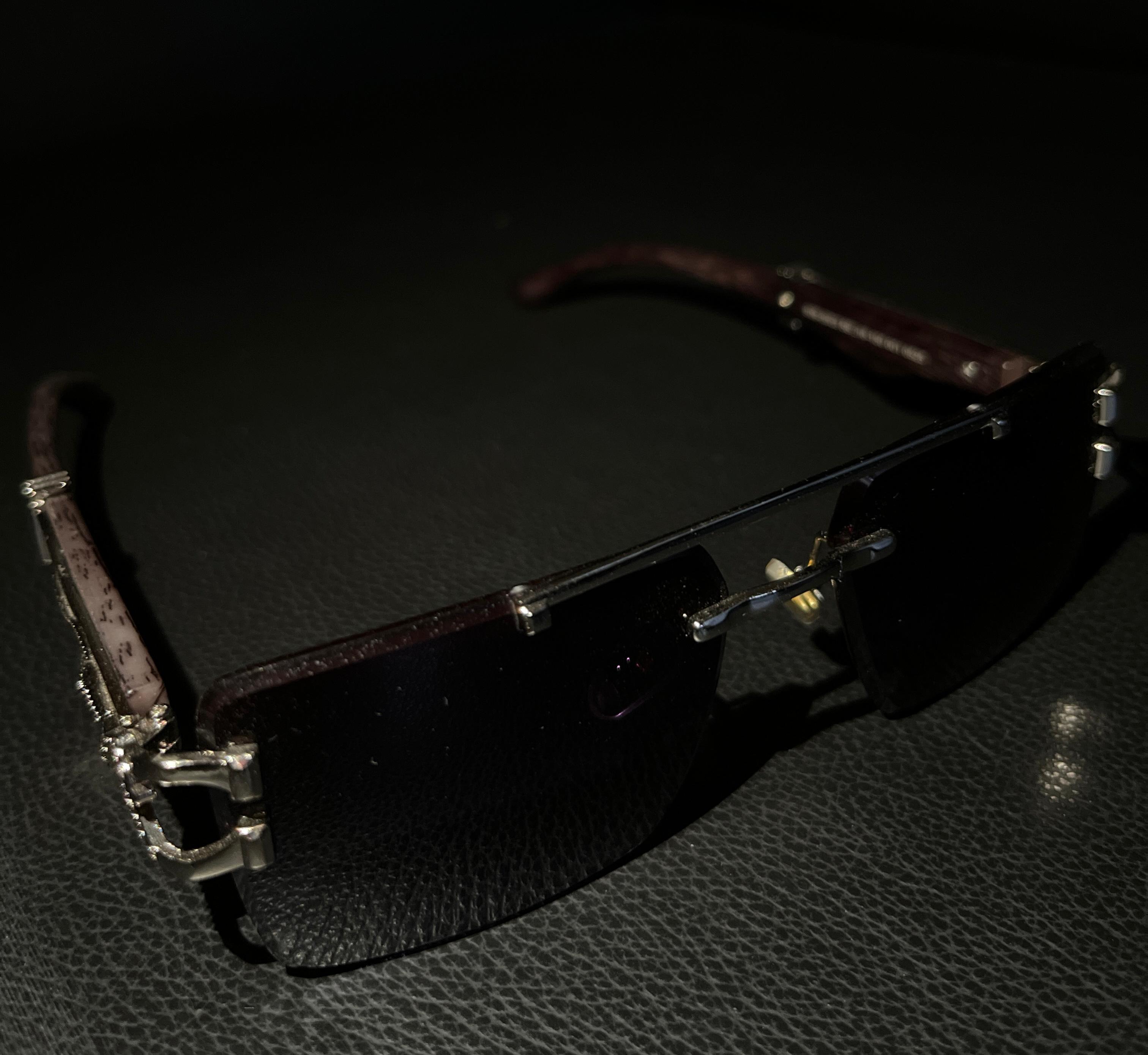  Meeran jaguar sunglasses with blue lenses and a black/gold frame, featuring UV protection